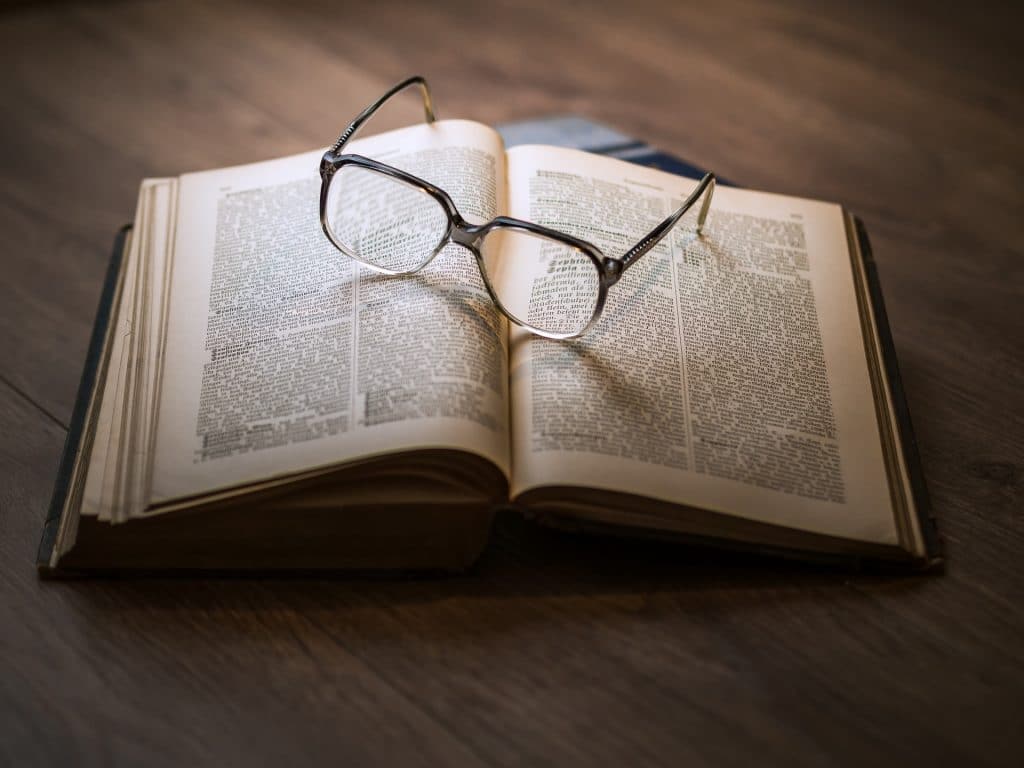 glasses on book