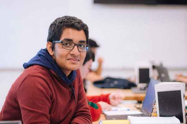 Boy student learning technology