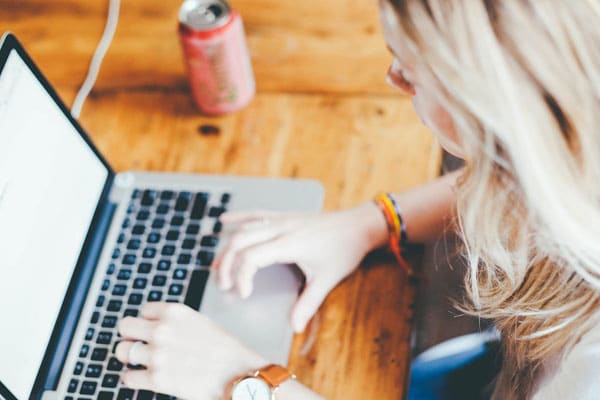 Woman on laptop learning from home